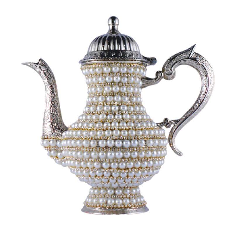 Solve Pearl Teapot jigsaw puzzle online with 64 pieces