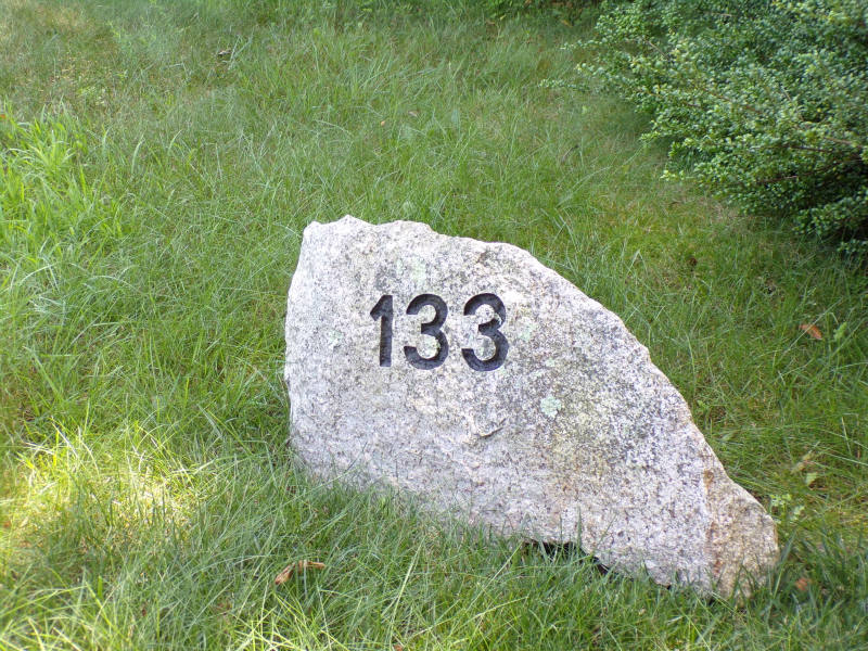 Solve Rock with house numbers jigsaw puzzle online with 12 pieces