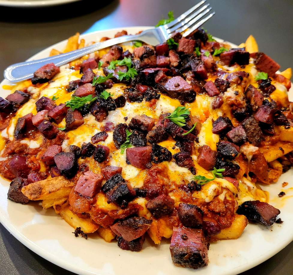 Solve Pastrami Chili Cheese Fries jigsaw puzzle online with 16 pieces
