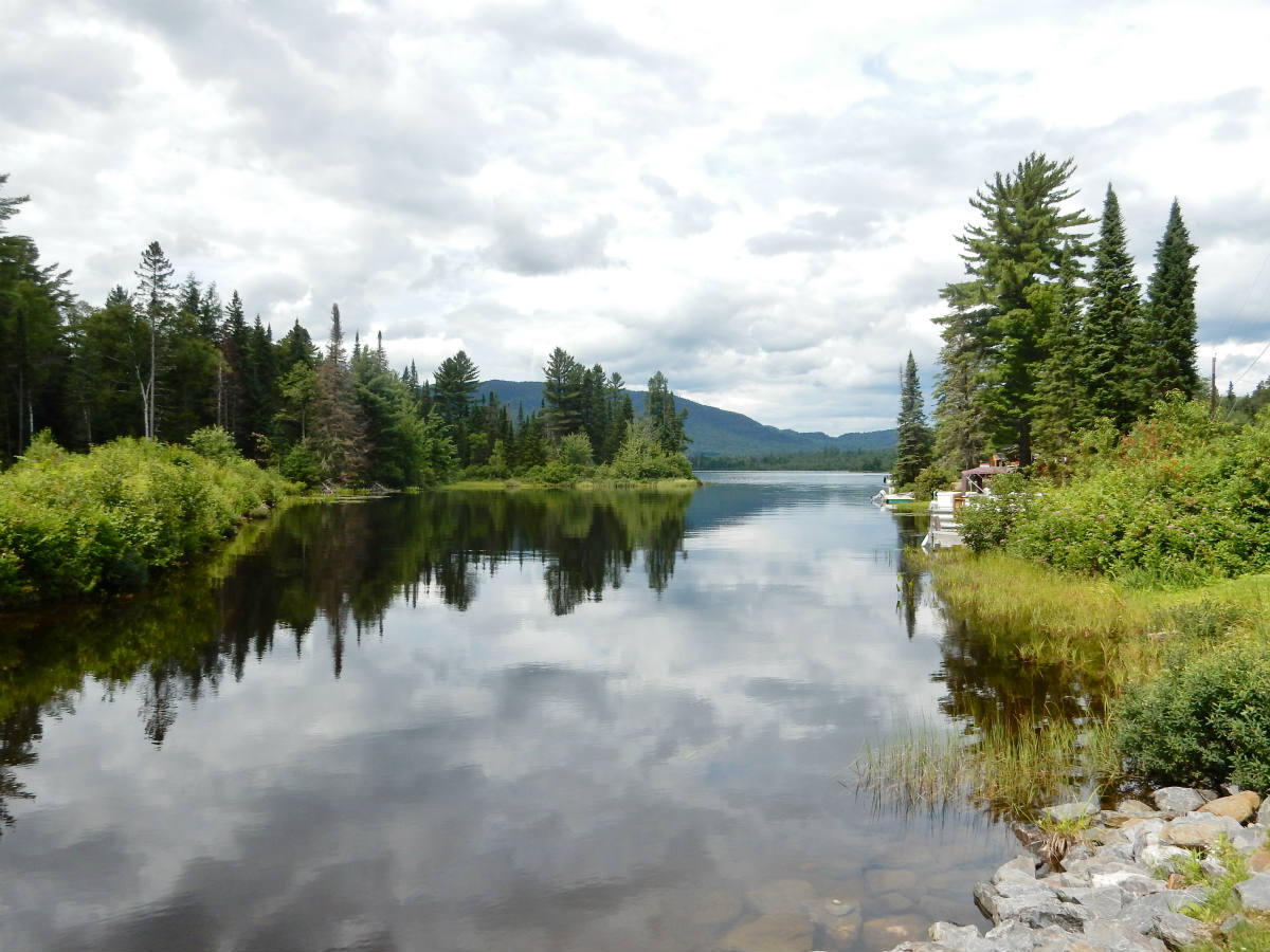 Solve Akers Pond in Errol, New Hampshire jigsaw puzzle online with 108