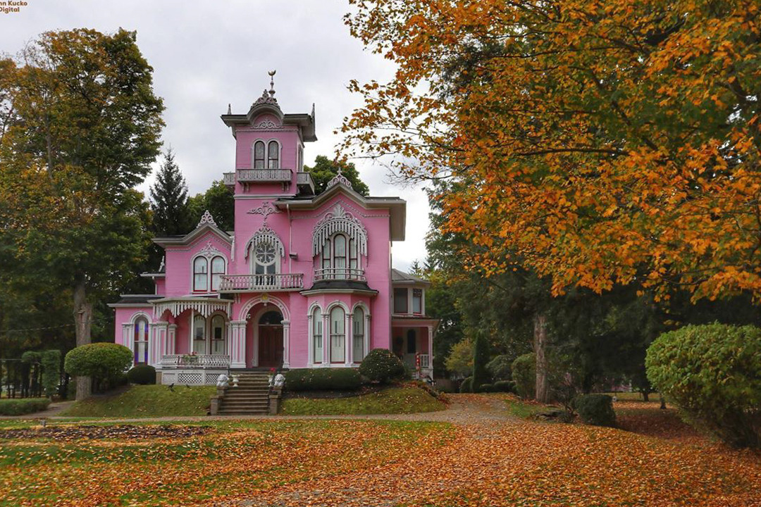 Solve Early autumn in Wellsville, New York at the “Pink House” by John Kucko Sepr 2019 jigsaw