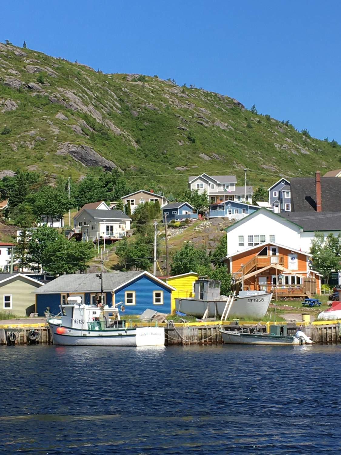 Solve 2022 July Petty Harbour, NL jigsaw puzzle online with 252 pieces