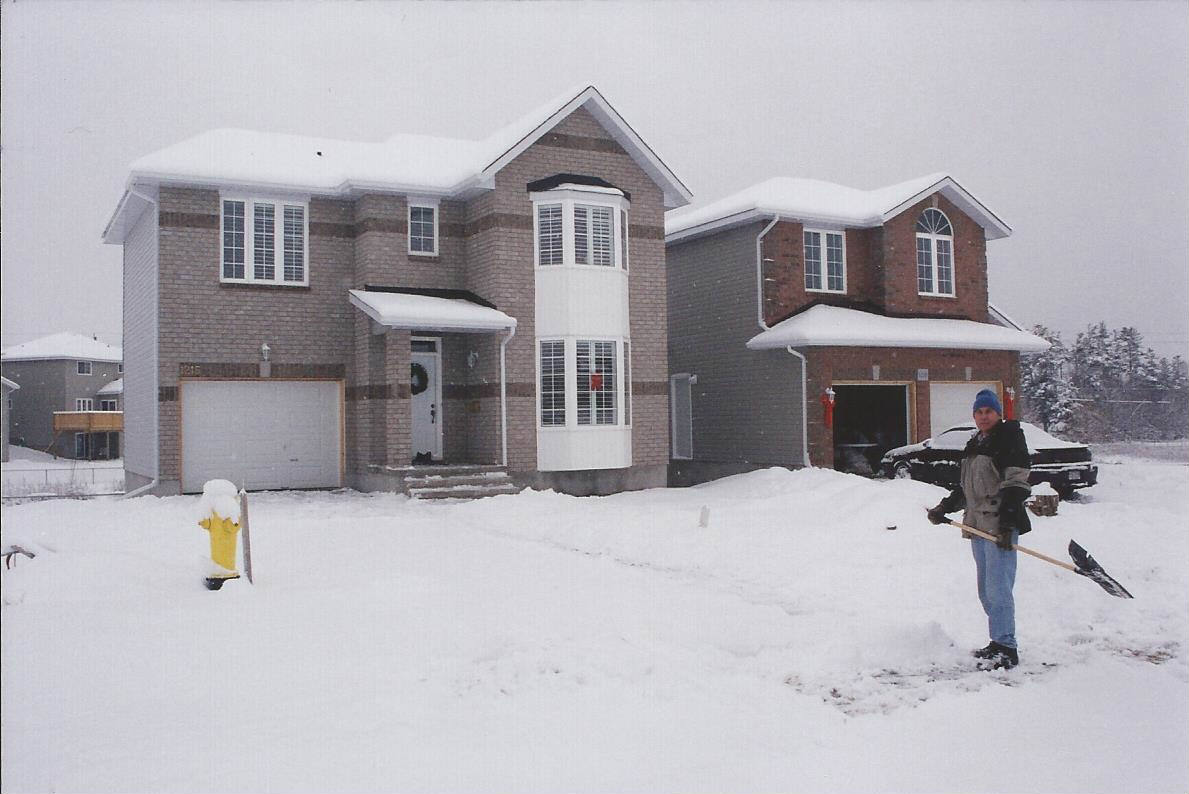 Solve Shovelling snow in Kingston, Ont. Canada jigsaw puzzle online